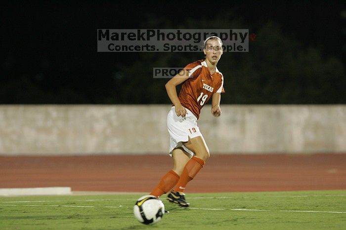 UT sophomore Erica Campanelli (#19, Defender). The University of Texas women's soccer team tied 0-0 against the Texas A&M Aggies Friday night, September 27, 2008.
Filename: SRM_20080926_2041501.jpg
Aperture: f/4.0
Shutter Speed: 1/200
Body: Canon EOS-1D Mark II
Lens: Canon EF 300mm f/2.8 L IS