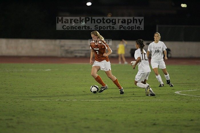 UT freshman Courtney Goodson (#7, Forward and Midfielder). The University of Texas women's soccer team tied 0-0 against the Texas A&M Aggies Friday night, September 27, 2008.
Filename: SRM_20080926_2047485.jpg
Aperture: f/2.8
Shutter Speed: 1/500
Body: Canon EOS-1D Mark II
Lens: Canon EF 300mm f/2.8 L IS