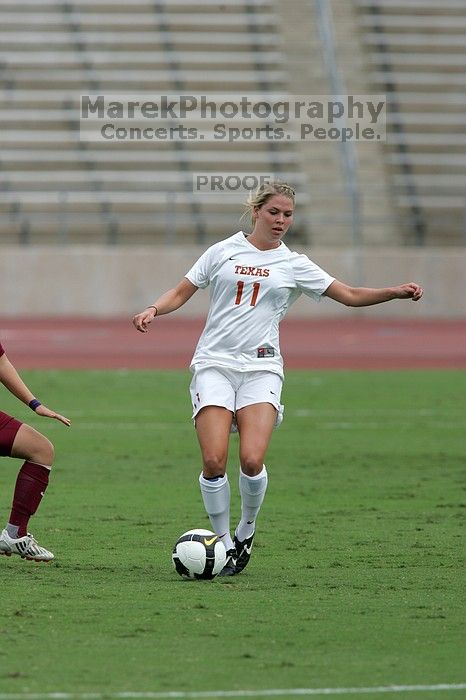 UT sophomore Niki Arlitt (#11, Forward). The University of Texas women's soccer team won 2-1 against the Iowa State Cyclones Sunday afternoon, October 5, 2008.
Filename: SRM_20081005_12054680.jpg
Aperture: f/5.6
Shutter Speed: 1/2000
Body: Canon EOS-1D Mark II
Lens: Canon EF 300mm f/2.8 L IS