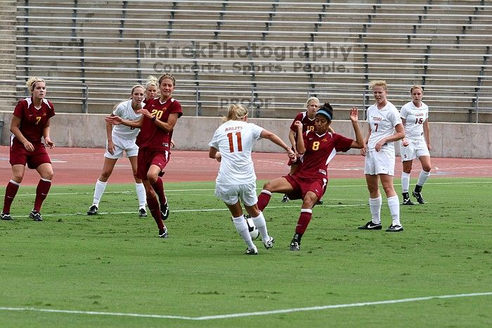 UT sophomore Niki Arlitt (#11, Forward) takes a shot on goal as UT freshman Courtney Goodson (#7, Forward and Midfielder), UT freshman Kylie Doniak (#15, Midfielder), and UT freshman Lucy Keith (#6, Midfielder) watch. The University of Texas women's soccer team won 2-1 against the Iowa State Cyclones Sunday afternoon, October 5, 2008.
Filename: SRM_20081005_12104433.jpg
Aperture: f/5.6
Shutter Speed: 1/1250
Body: Canon EOS 20D
Lens: Canon EF 80-200mm f/2.8 L