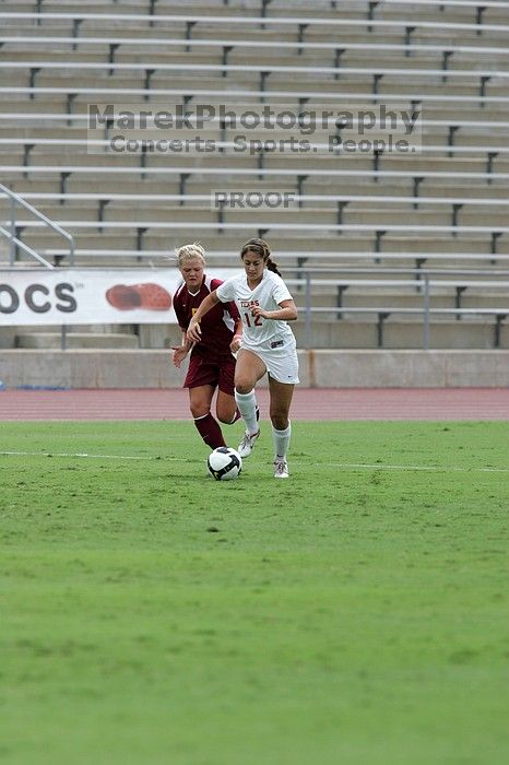 UT sophomore Alisha Ortiz (#12, Forward). The University of Texas women's soccer team won 2-1 against the Iowa State Cyclones Sunday afternoon, October 5, 2008.
Filename: SRM_20081005_12115855.jpg
Aperture: f/5.6
Shutter Speed: 1/1600
Body: Canon EOS-1D Mark II
Lens: Canon EF 300mm f/2.8 L IS