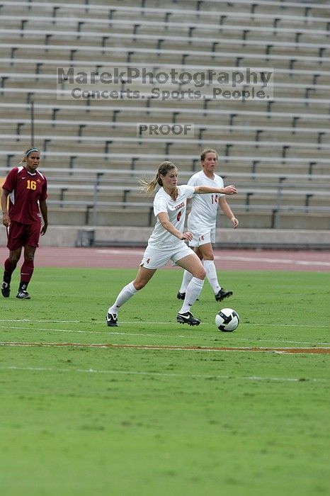 UT senior Jill Gilbeau (#4, Defender and Midfielder). The University of Texas women's soccer team won 2-1 against the Iowa State Cyclones Sunday afternoon, October 5, 2008.
Filename: SRM_20081005_12120259.jpg
Aperture: f/5.6
Shutter Speed: 1/1600
Body: Canon EOS-1D Mark II
Lens: Canon EF 300mm f/2.8 L IS
