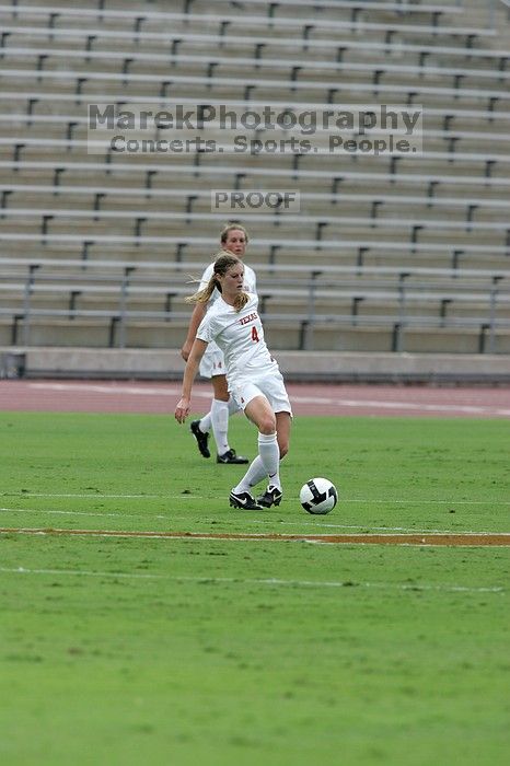 UT senior Jill Gilbeau (#4, Defender and Midfielder). The University of Texas women's soccer team won 2-1 against the Iowa State Cyclones Sunday afternoon, October 5, 2008.
Filename: SRM_20081005_12120260.jpg
Aperture: f/5.6
Shutter Speed: 1/2000
Body: Canon EOS-1D Mark II
Lens: Canon EF 300mm f/2.8 L IS