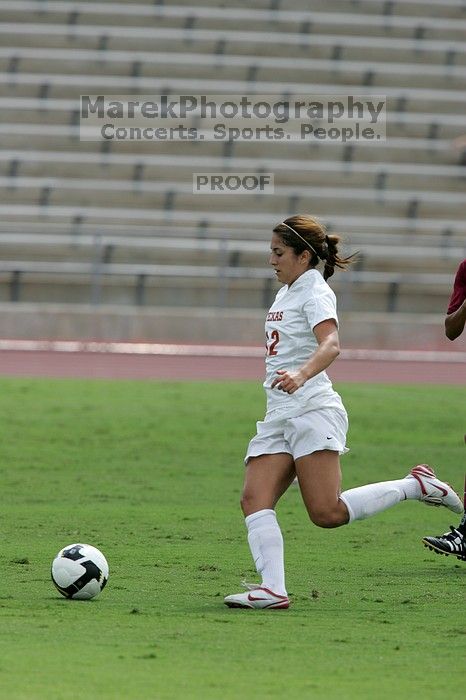 UT sophomore Alisha Ortiz (#12, Forward). The University of Texas women's soccer team won 2-1 against the Iowa State Cyclones Sunday afternoon, October 5, 2008.
Filename: SRM_20081005_12171638.jpg
Aperture: f/5.6
Shutter Speed: 1/1600
Body: Canon EOS-1D Mark II
Lens: Canon EF 300mm f/2.8 L IS
