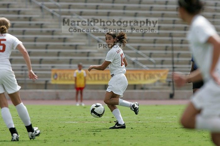 UT senior Stephanie Logterman (#10, Defender) runs with the ball. The University of Texas women's soccer team won 2-1 against the Iowa State Cyclones Sunday afternoon, October 5, 2008.
Filename: SRM_20081005_12314811.jpg
Aperture: f/5.6
Shutter Speed: 1/2000
Body: Canon EOS-1D Mark II
Lens: Canon EF 300mm f/2.8 L IS