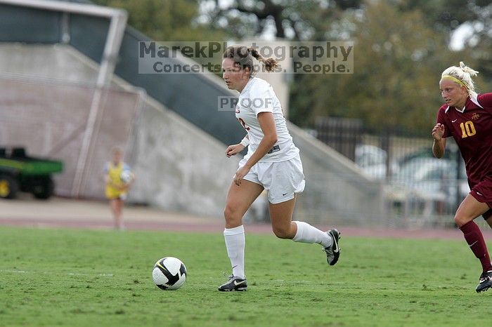 UT junior Stephanie Gibson (#22, Defense and Forward) steals the ball from an Iowa State player. The University of Texas women's soccer team won 2-1 against the Iowa State Cyclones Sunday afternoon, October 5, 2008.
Filename: SRM_20081005_12364449.jpg
Aperture: f/5.6
Shutter Speed: 1/1000
Body: Canon EOS-1D Mark II
Lens: Canon EF 300mm f/2.8 L IS
