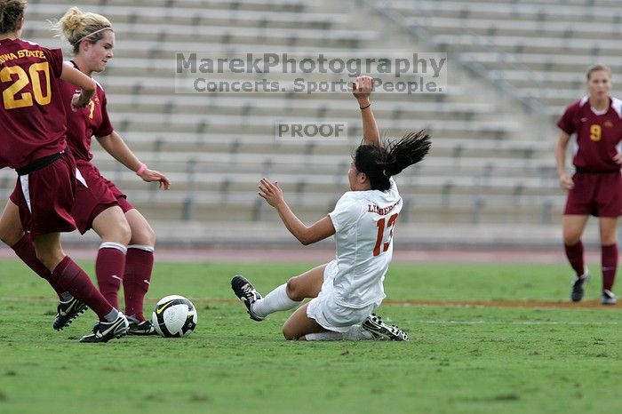 UT freshman Amanda Lisberger (#13, Midfielder) comes in for a slide tackle. The University of Texas women's soccer team won 2-1 against the Iowa State Cyclones Sunday afternoon, October 5, 2008.
Filename: SRM_20081005_12371859.jpg
Aperture: f/5.6
Shutter Speed: 1/1250
Body: Canon EOS-1D Mark II
Lens: Canon EF 300mm f/2.8 L IS