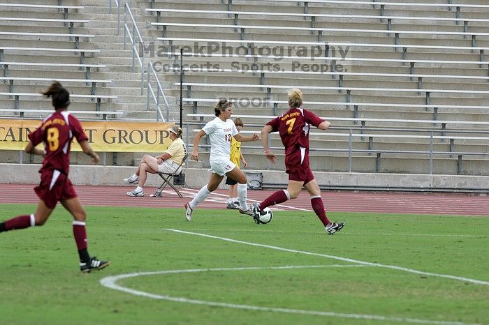 UT sophomore Alisha Ortiz (#12, Forward) in the second half. The University of Texas women's soccer team won 2-1 against the Iowa State Cyclones Sunday afternoon, October 5, 2008.
Filename: SRM_20081005_13014675.jpg
Aperture: f/5.6
Shutter Speed: 1/1250
Body: Canon EOS-1D Mark II
Lens: Canon EF 300mm f/2.8 L IS
