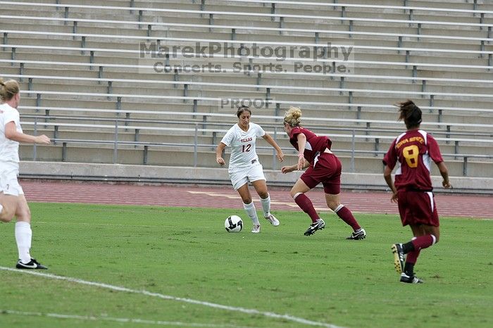 UT sophomore Alisha Ortiz (#12, Forward) in the second half. The University of Texas women's soccer team won 2-1 against the Iowa State Cyclones Sunday afternoon, October 5, 2008.
Filename: SRM_20081005_13014882.jpg
Aperture: f/5.6
Shutter Speed: 1/1250
Body: Canon EOS-1D Mark II
Lens: Canon EF 300mm f/2.8 L IS