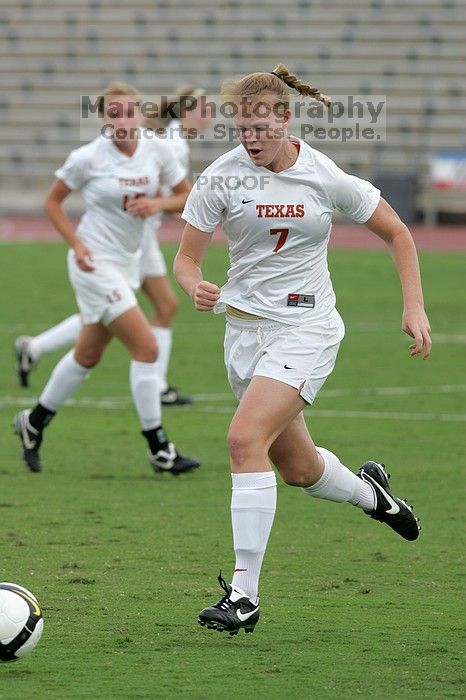 UT freshman Courtney Goodson (#7, Forward and Midfielder) in the second half. The University of Texas women's soccer team won 2-1 against the Iowa State Cyclones Sunday afternoon, October 5, 2008.
Filename: SRM_20081005_13025413.jpg
Aperture: f/5.6
Shutter Speed: 1/1600
Body: Canon EOS-1D Mark II
Lens: Canon EF 300mm f/2.8 L IS