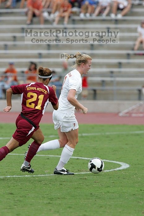 UT freshman Courtney Goodson (#7, Forward and Midfielder) in the second half. The University of Texas women's soccer team won 2-1 against the Iowa State Cyclones Sunday afternoon, October 5, 2008.
Filename: SRM_20081005_13110655.jpg
Aperture: f/5.6
Shutter Speed: 1/1000
Body: Canon EOS-1D Mark II
Lens: Canon EF 300mm f/2.8 L IS