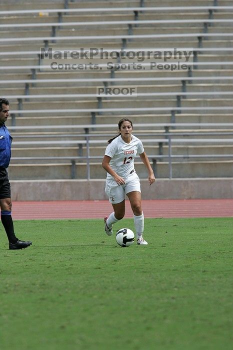 UT sophomore Alisha Ortiz (#12, Forward) in the second half. The University of Texas women's soccer team won 2-1 against the Iowa State Cyclones Sunday afternoon, October 5, 2008.
Filename: SRM_20081005_13232826.jpg
Aperture: f/5.6
Shutter Speed: 1/2000
Body: Canon EOS-1D Mark II
Lens: Canon EF 300mm f/2.8 L IS