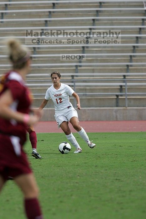 UT sophomore Alisha Ortiz (#12, Forward) in the second half. The University of Texas women's soccer team won 2-1 against the Iowa State Cyclones Sunday afternoon, October 5, 2008.
Filename: SRM_20081005_13232827.jpg
Aperture: f/5.6
Shutter Speed: 1/2000
Body: Canon EOS-1D Mark II
Lens: Canon EF 300mm f/2.8 L IS