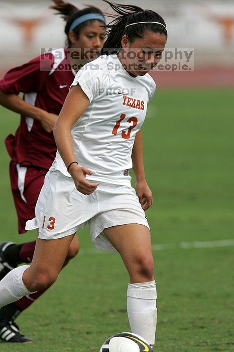 UT freshman Amanda Lisberger (#13, Midfielder) in the second half.  The University of Texas women's soccer team won 2-1 against the Iowa State Cyclones Sunday afternoon, October 5, 2008.

Filename: SRM_20081005_13315239.jpg
Aperture: f/5.6
Shutter Speed: 1/2000
Body: Canon EOS-1D Mark II
Lens: Canon EF 300mm f/2.8 L IS