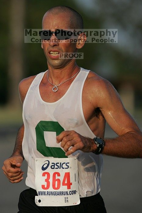 The Army Dillo half-marathon and 32K race.

Filename: SRM_20080921_0821363.jpg
Aperture: f/4.0
Shutter Speed: 1/2000
Body: Canon EOS-1D Mark II
Lens: Canon EF 300mm f/2.8 L IS