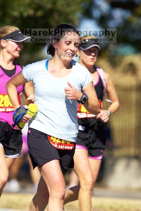 Beth Marek, bib #4236, completed the course in 3:38:21, a Boston Marathon qualifying time.  The first annual San Antonio Rock and Roll Marathon, Sunday, November 16, 2008.
Filename: SRM_20081116_11153861.jpg
Aperture: f/4.0
Shutter Speed: 1/2000
Body: Canon EOS-1D Mark II
Lens: Canon EF 300mm f/2.8 L IS