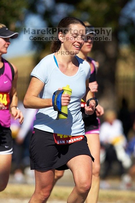 Beth Marek, bib #4236, completed the course in 3:38:21, a Boston Marathon qualifying time. The first annual San Antonio Rock and Roll Marathon, Sunday, November 16, 2008.
Filename: SRM_20081116_11154063.jpg
Aperture: f/4.0
Shutter Speed: 1/3200
Body: Canon EOS-1D Mark II
Lens: Canon EF 300mm f/2.8 L IS