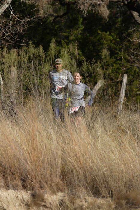 Beth Marek placed 5th in her age group in the 25K at the. Bandera 25K, 50K, and 100K trail race in Bandera, TX on Saturday, January 10, 2009.

Filename: SRM_20090110_10172886.jpg
Aperture: f/5.6
Shutter Speed: 1/640
Body: Canon EOS-1D Mark II
Lens: Canon EF 300mm f/2.8 L IS
