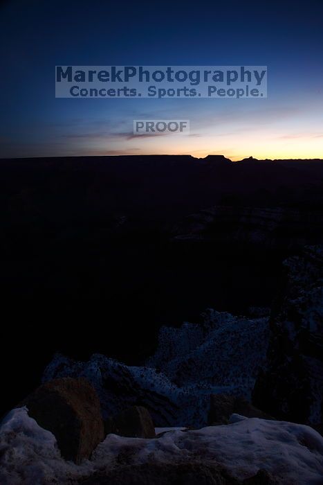 First sunrise of the new year at the south rim of the Grand Canyon, Thursday January 1, 2009.  The temperature was as low as 15 F the night before with a foot and a half of snow on the ground.  Luckily sunrise wasn't until 7:40.

Filename: SRM_20090101_07132490.JPG
Aperture: f/11.0
Shutter Speed: 6/1
Body: Canon EOS-1D Mark II
Lens: Canon EF 16-35mm f/2.8 L