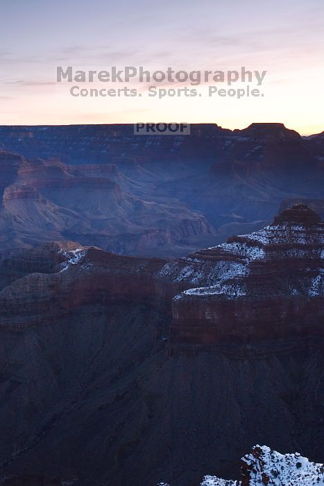 First sunrise of the new year at the south rim of the Grand Canyon, Thursday January 1, 2009.  The temperature was as low as 15 F the night before with a foot and a half of snow on the ground.  Luckily sunrise wasn't until 7:40.

Filename: SRM_20090101_07194892.JPG
Aperture: f/11.0
Shutter Speed: 10/1
Body: Canon EOS-1D Mark II
Lens: Canon EF 16-35mm f/2.8 L