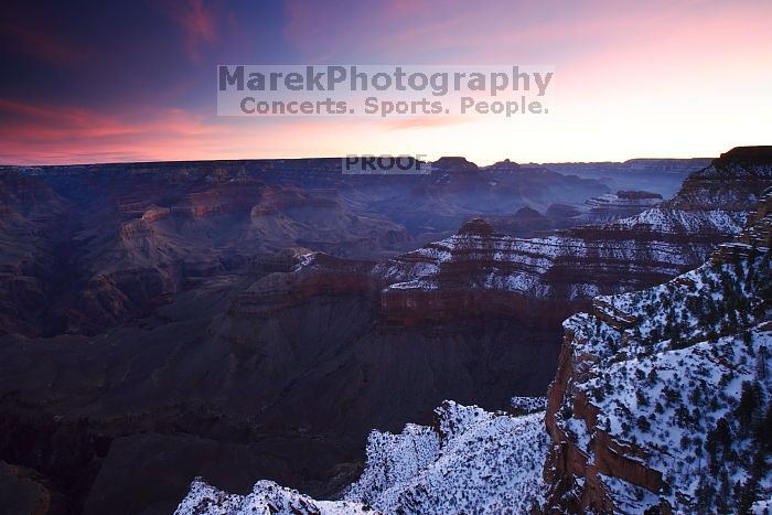First sunrise of the new year at the south rim of the Grand Canyon, Thursday January 1, 2009.  The temperature was as low as 15 F the night before with a foot and a half of snow on the ground.  Luckily sunrise wasn't until 7:40.

Filename: SRM_20090101_07245396.JPG
Aperture: f/11.0
Shutter Speed: 4/1
Body: Canon EOS-1D Mark II
Lens: Canon EF 16-35mm f/2.8 L