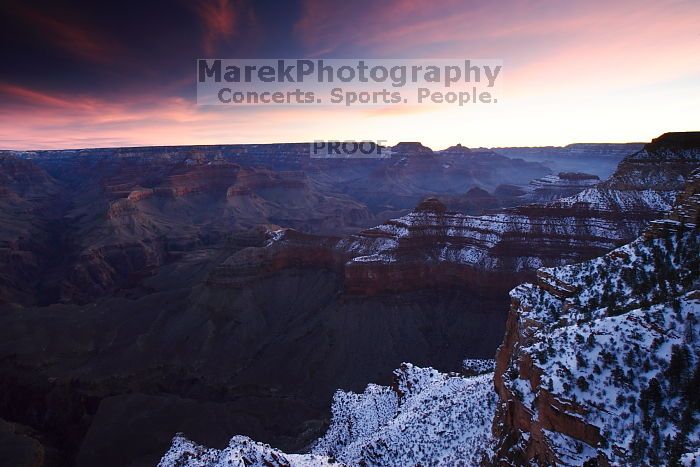 First sunrise of the new year at the south rim of the Grand Canyon, Thursday January 1, 2009.  The temperature was as low as 15 F the night before with a foot and a half of snow on the ground.  Luckily sunrise wasn't until 7:40.

Filename: SRM_20090101_07265998.JPG
Aperture: f/16.0
Shutter Speed: 5/1
Body: Canon EOS-1D Mark II
Lens: Canon EF 16-35mm f/2.8 L