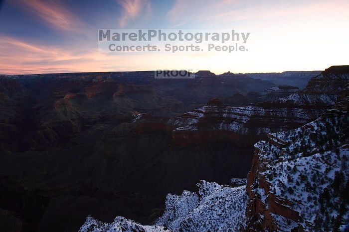 First sunrise of the new year at the south rim of the Grand Canyon, Thursday January 1, 2009.  The temperature was as low as 15 F the night before with a foot and a half of snow on the ground.  Luckily sunrise wasn't until 7:40.

Filename: SRM_20090101_07291700.JPG
Aperture: f/16.0
Shutter Speed: 25/10
Body: Canon EOS-1D Mark II
Lens: Canon EF 16-35mm f/2.8 L