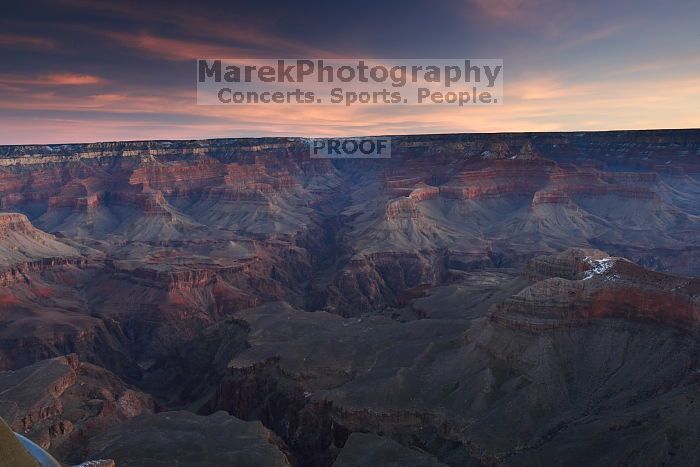 First sunrise of the new year at the south rim of the Grand Canyon, Thursday January 1, 2009.  The temperature was as low as 15 F the night before with a foot and a half of snow on the ground.  Luckily sunrise wasn't until 7:40.

Filename: SRM_20090101_07325803.JPG
Aperture: f/16.0
Shutter Speed: 32/10
Body: Canon EOS-1D Mark II
Lens: Canon EF 16-35mm f/2.8 L