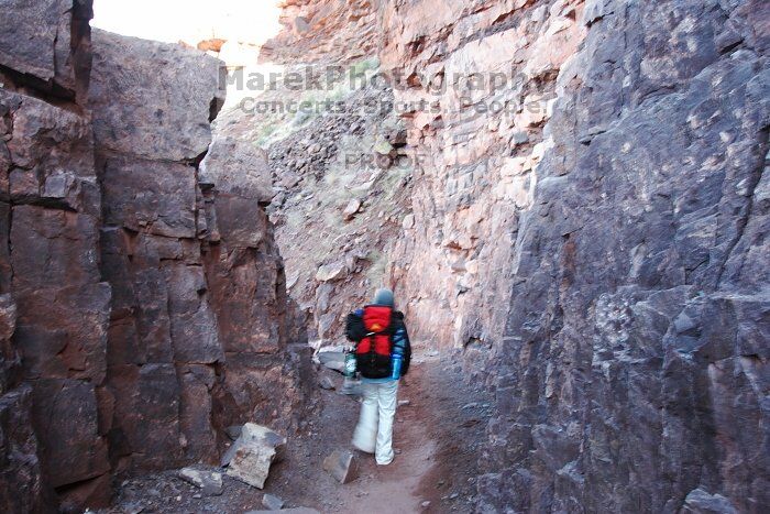 Beth Marek hiking down the South Kaibab trail, backpacking the Grand Canyon with Beth, Thursday, January 1, 2009.
Filename: SRM_20090101_15274679.jpg
Aperture: f/11.0
Shutter Speed: 1/5
Body: Canon EOS-1D Mark II
Lens: Canon EF 16-35mm f/2.8 L