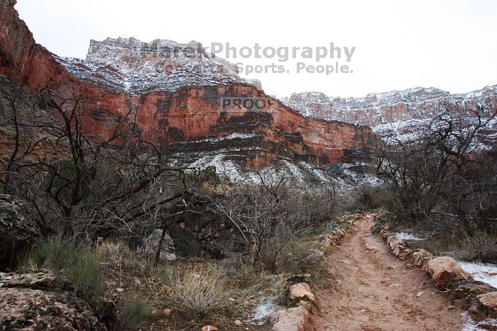 Hike up the Bright Angel trail from Indian Gardens campground, while backpacking the Grand Canyon, on Sunday, January 4, 2009.

Filename: SRM_20090104_08390052.JPG
Aperture: f/8.0
Shutter Speed: 1/20
Body: Canon EOS-1D Mark II
Lens: Canon EF 16-35mm f/2.8 L