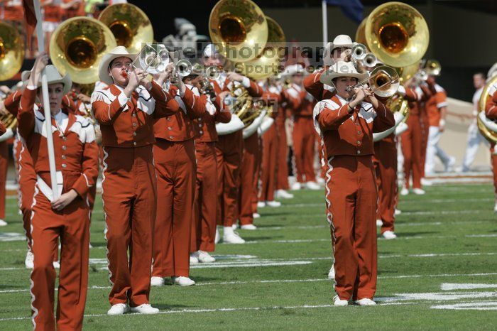 The UT marching band takes the field before the Arkansas football game. The University of Texas football team defeated the Arkansas Razorbacks with a score of 52-10 in Austin, TX on Saturday, September 27, 2008.
Filename: SRM_20080927_14200423.jpg
Aperture: f/5.6
Shutter Speed: 1/1600
Body: Canon EOS-1D Mark II
Lens: Canon EF 300mm f/2.8 L IS