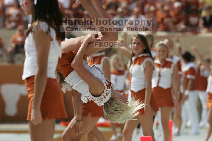 Texas Cheerleaders. The University of Texas football team defeated the Arkansas Razorbacks with a score of 52-10 in Austin, TX on Saturday, September 27, 2008.
Filename: SRM_20080927_15183061.jpg
Aperture: f/6.3
Shutter Speed: 1/1000
Body: Canon EOS-1D Mark II
Lens: Canon EF 300mm f/2.8 L IS