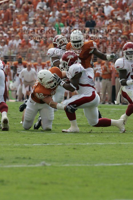 The University of Texas football team defeated the Arkansas Razorbacks with a score of 52-10 in Austin, TX on Saturday, September 27, 2008.
Filename: SRM_20080927_15191469.jpg
Aperture: f/6.3
Shutter Speed: 1/640
Body: Canon EOS-1D Mark II
Lens: Canon EF 300mm f/2.8 L IS