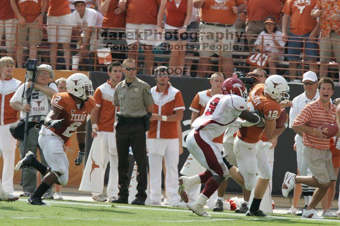 The University of Texas football team defeated the Arkansas Razorbacks with a score of 52-10 in Austin, TX on Saturday, September 27, 2008.
Filename: SRM_20080927_15360044.jpg
Aperture: f/5.6
Shutter Speed: 1/1250
Body: Canon EOS-1D Mark II
Lens: Canon EF 300mm f/2.8 L IS