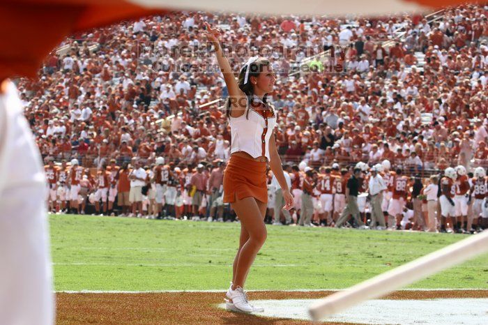 Texas Cheerleaders.  The University of Texas football team defeated the Arkansas Razorbacks with a score of 52-10 in Austin, TX on Saturday, September 27, 2008.

Filename: SRM_20080927_15392870.jpg
Aperture: f/5.6
Shutter Speed: 1/1600
Body: Canon EOS 20D
Lens: Canon EF 80-200mm f/2.8 L