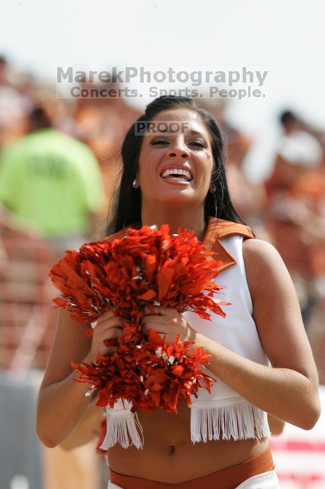 Texas Pom. The University of Texas football team defeated the Arkansas Razorbacks with a score of 52-10 in Austin, TX on Saturday, September 27, 2008.
Filename: SRM_20080927_15414884.jpg
Aperture: f/5.6
Shutter Speed: 1/1250
Body: Canon EOS-1D Mark II
Lens: Canon EF 300mm f/2.8 L IS