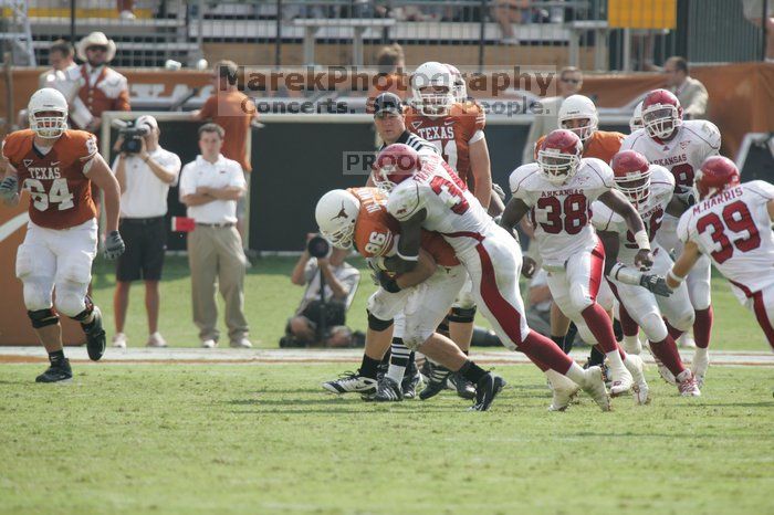 The University of Texas football team defeated the Arkansas Razorbacks with a score of 52-10 in Austin, TX on Saturday, September 27, 2008.

Filename: SRM_20080927_15531610.jpg
Aperture: f/5.6
Shutter Speed: 1/1000
Body: Canon EOS-1D Mark II
Lens: Canon EF 300mm f/2.8 L IS