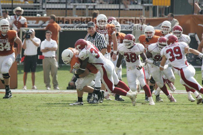 The University of Texas football team defeated the Arkansas Razorbacks with a score of 52-10 in Austin, TX on Saturday, September 27, 2008.

Filename: SRM_20080927_15531611.jpg
Aperture: f/5.6
Shutter Speed: 1/1000
Body: Canon EOS-1D Mark II
Lens: Canon EF 300mm f/2.8 L IS