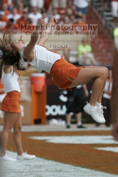 Texas Cheerleaders. The University of Texas football team defeated the Arkansas Razorbacks with a score of 52-10 in Austin, TX on Saturday, September 27, 2008.
Filename: SRM_20080927_16012020.jpg
Aperture: f/5.6
Shutter Speed: 1/1000
Body: Canon EOS-1D Mark II
Lens: Canon EF 300mm f/2.8 L IS