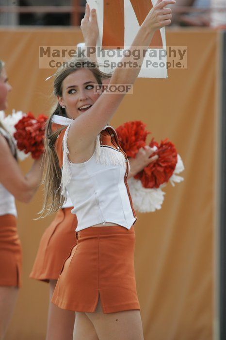 Texas Cheerleaders. The University of Texas football team defeated the Arkansas Razorbacks with a score of 52-10 in Austin, TX on Saturday, September 27, 2008.
Filename: SRM_20080927_17102673.jpg
Aperture: f/5.6
Shutter Speed: 1/640
Body: Canon EOS-1D Mark II
Lens: Canon EF 300mm f/2.8 L IS