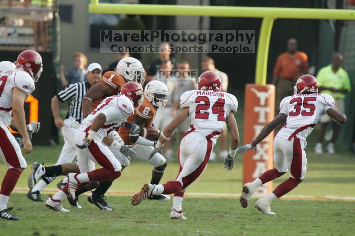 The University of Texas football team defeated the Arkansas Razorbacks with a score of 52-10 in Austin, TX on Saturday, September 27, 2008.
Filename: SRM_20080927_17382481.jpg
Aperture: f/5.6
Shutter Speed: 1/800
Body: Canon EOS-1D Mark II
Lens: Canon EF 300mm f/2.8 L IS