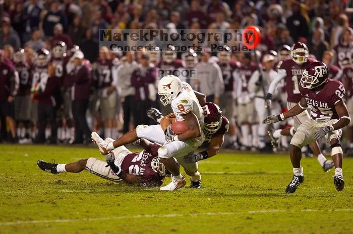The University of Texas, Austin played Texas A&M in football at Kyle Field, College Station, on November 23, 2007. UT lost to the Aggies, 30 to 38.
Filename: SRM_20071123_1852349.jpg
Aperture: f/2.8
Shutter Speed: 1/500
Body: Canon EOS-1D Mark II
Lens: Canon EF 300mm f/2.8 L IS