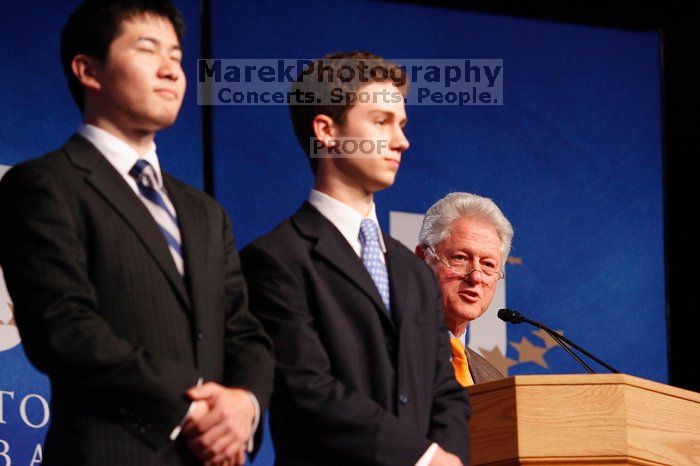 Former President Bill Clinton hands out commitment certificates to CGIU attendees for their exceptional pledges to the CGI cause during the opening plenary session of the CGIU meeting. Day one of the 2nd Annual Clinton Global Initiative University (CGIU) meeting was held at The University of Texas at Austin, Friday, February 13, 2009.
Filename: SRM_20090213_16452209.jpg
Aperture: f/4.0
Shutter Speed: 1/125
Body: Canon EOS-1D Mark II
Lens: Canon EF 80-200mm f/2.8 L
