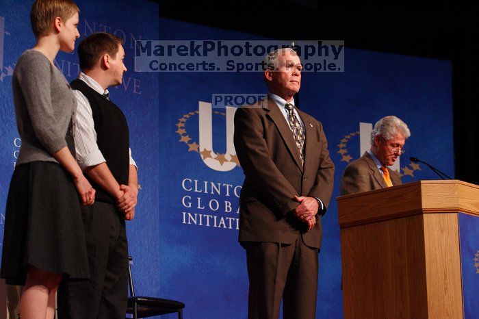 Former President Bill Clinton hands out commitment certificates to CGIU attendees for their exceptional pledges to the CGI cause during the opening plenary session of the CGIU meeting. Day one of the 2nd Annual Clinton Global Initiative University (CGIU) meeting was held at The University of Texas at Austin, Friday, February 13, 2009.
Filename: SRM_20090213_16481748.jpg
Aperture: f/4.0
Shutter Speed: 1/160
Body: Canon EOS-1D Mark II
Lens: Canon EF 80-200mm f/2.8 L