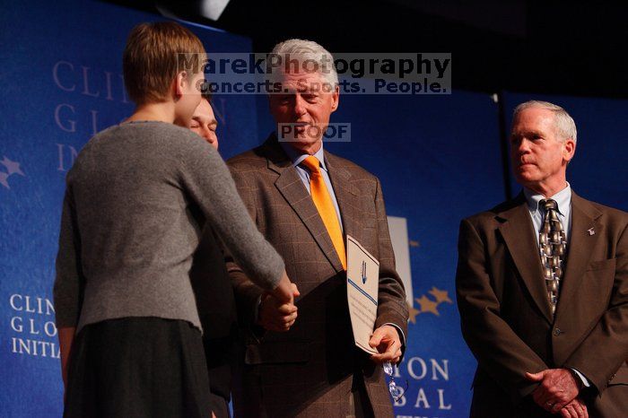 Former President Bill Clinton hands out commitment certificates to CGIU attendees for their exceptional pledges to the CGI cause during the opening plenary session of the CGIU meeting. Day one of the 2nd Annual Clinton Global Initiative University (CGIU) meeting was held at The University of Texas at Austin, Friday, February 13, 2009.
Filename: SRM_20090213_16504979.jpg
Aperture: f/4.0
Shutter Speed: 1/200
Body: Canon EOS-1D Mark II
Lens: Canon EF 80-200mm f/2.8 L