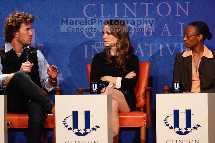 Blake Mycoskie (L), founder of TOMS shoes, Natalie Portman (C), and Mambidzeni Madzivire (R), BME graduate student at Mayo Graduate School, at the first plenary session of the CGIU meeting. Day one of the 2nd Annual Clinton Global Initiative University (CGIU) meeting was held at The University of Texas at Austin, Friday, February 13, 2009.
Filename: SRM_20090213_17134085.jpg
Aperture: f/5.6
Shutter Speed: 1/250
Body: Canon EOS-1D Mark II
Lens: Canon EF 300mm f/2.8 L IS