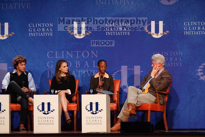 Blake Mycoskie (1-L), founder of TOMS shoes, Natalie Portman (2-L), Mambidzeni Madzivire (2-R), BME graduate student at Mayo Graduate School, and Former President Bill Clinton (1-R) at the first plenary session of the CGIU meeting.  Day one of the 2nd Annual Clinton Global Initiative University (CGIU) meeting was held at The University of Texas at Austin, Friday, February 13, 2009.
Filename: SRM_20090213_17290846.jpg
Aperture: f/4.0
Shutter Speed: 1/320
Body: Canon EOS-1D Mark II
Lens: Canon EF 300mm f/2.8 L IS