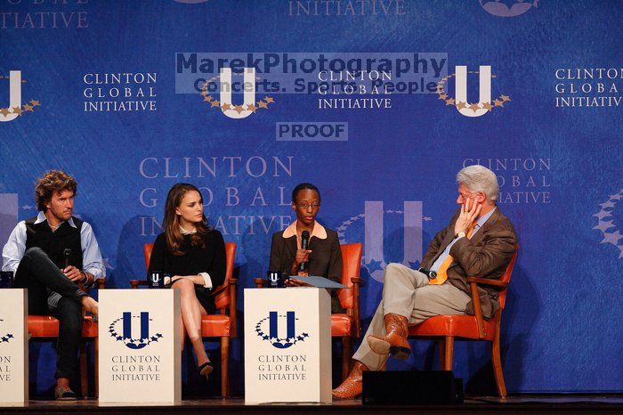 Blake Mycoskie (1-L), founder of TOMS shoes, Natalie Portman (2-L), Mambidzeni Madzivire (2-R), BME graduate student at Mayo Graduate School, and Former President Bill Clinton (1-R) at the first plenary session of the CGIU meeting.  Day one of the 2nd Annual Clinton Global Initiative University (CGIU) meeting was held at The University of Texas at Austin, Friday, February 13, 2009.
Filename: SRM_20090213_17290847.jpg
Aperture: f/4.0
Shutter Speed: 1/320
Body: Canon EOS-1D Mark II
Lens: Canon EF 300mm f/2.8 L IS