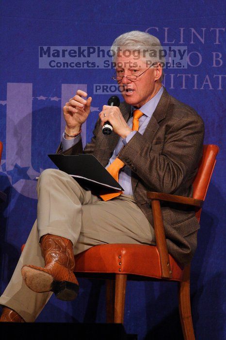 Former President Bill Clinton moderated the discussion between Natalie Portman, Mambidzeni Madzivire, BME graduate student at Mayo Graduate School, Blake Mycoskie, founder of TOMS shoes, and Paul Bell, president of Dell Global Public, during the first plenary session at the CGIU meeting.  Day one of the 2nd Annual Clinton Global Initiative University (CGIU) meeting was held at The University of Texas at Austin, Friday, February 13, 2009.

Filename: SRM_20090213_17351008.jpg
Aperture: f/5.6
Shutter Speed: 1/250
Body: Canon EOS 20D
Lens: Canon EF 300mm f/2.8 L IS