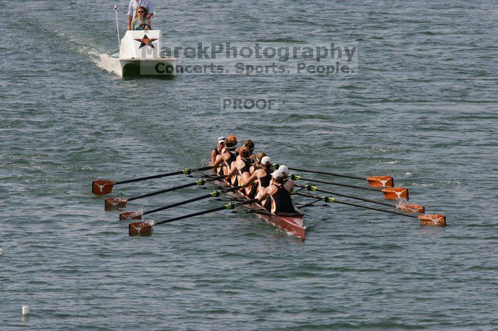 The Texas Rowing first varsity eight team, with coxswain Mary Cait McPherson, stroke Jen VanderMaarel, Felicia Izaguirre-Werner, Meg George, Nancy Arrington, Jelena Zunic, Karli Sheahan, Colleen Irby and Sara Cottingham, finished with a time of 7:09.3, losing to Wisconsin, which completed the race in 7:01.1. This was the third session of the Longhorn Invitational, Saturday afternoon, March 21, 2009 on Lady Bird Lake.

Filename: SRM_20090321_16352093.jpg
Aperture: f/8.0
Shutter Speed: 1/1600
Body: Canon EOS-1D Mark II
Lens: Canon EF 300mm f/2.8 L IS